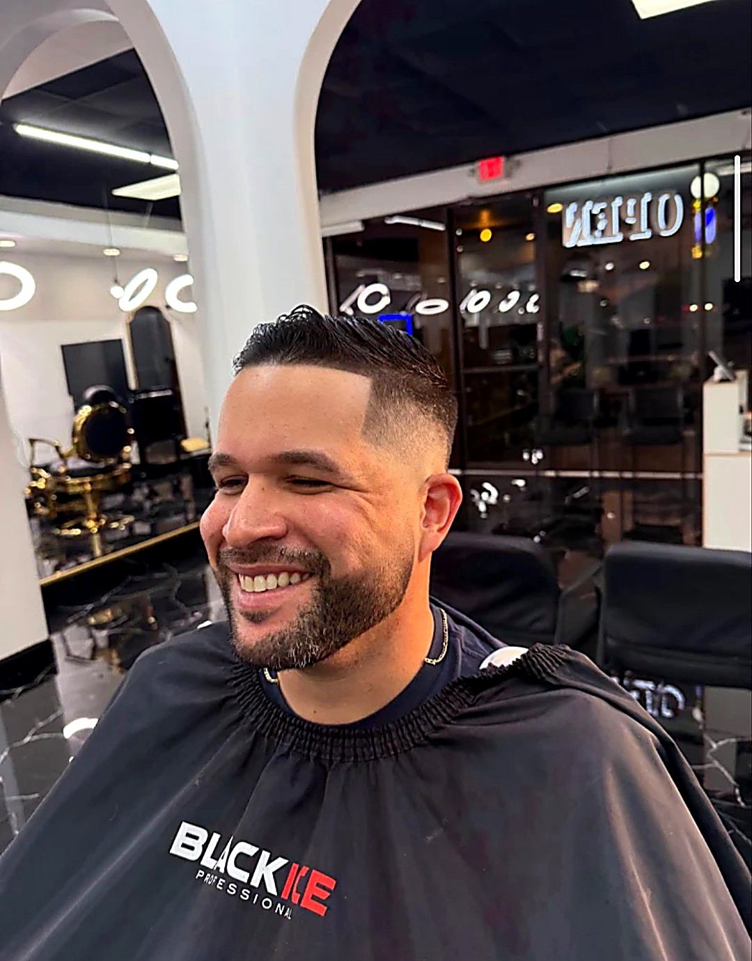 Fade haircut with beard at Top Barber Tomball